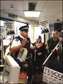 Youth Fight for Jobs joined protestors at Westminster Tesco against workfare and occupied it for an hour until thrown out by the police,18 February 2012, photo Suzanne Beishon