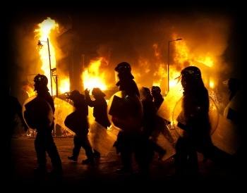 Riots: rioters and police in Tottenham during August 2011 disturbances , photo by Paul Mattsson