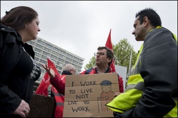 Unite members at St Thomas' Hospital on strike 10 May 2012 as part of the nationwide strike of workers in the public sector against attacks on pensions , photo Paul Mattsson