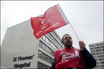 Unite members at St Thomas' Hospital on strike 10 May 2012 as part of the nationwide strike of workers in the public sector against attacks on pensions , photo Paul Mattsson