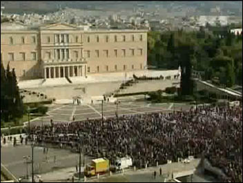 Protesters clash with police outside the Greek parliament October 2011, photo by RT free video