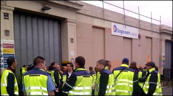 Bus drivers at the Longbridge Road bus garage in Barking out on the picket line , photo by Hannah Sell