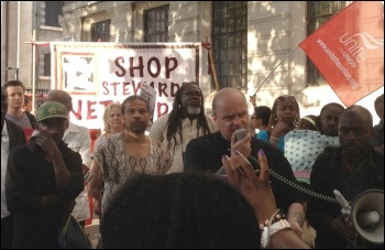 Steve Hedley, assistant general secretary, RMT, addresses lobby of South African embassy after shooting of SA miners, photo by Suzanne Beishon