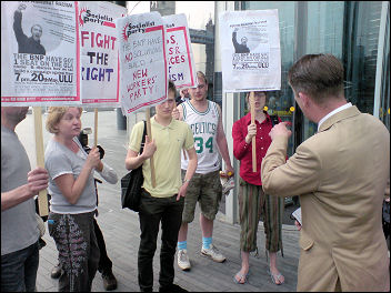 Protesters confront BNP GLA assembly member Richard Barnbrook, photo Bob Severn