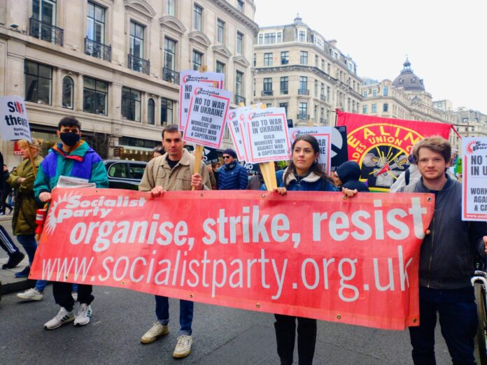 Socialist Party marching in London, calling for workers' unity to end the war in Ukraine. Photo London Socialist Party