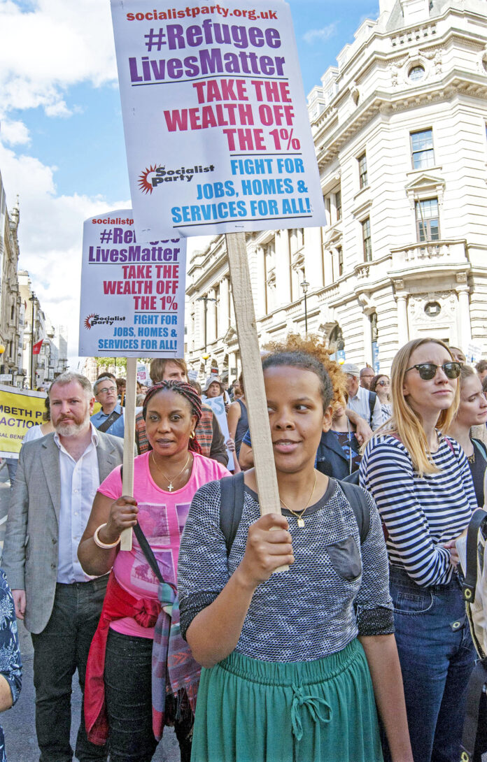 Take the wealth off the 1% to fund services for refugees. Photo: Paul Mattsson Take the wealth off the 1% to fund services for refugees. Photo: Paul Mattsson
