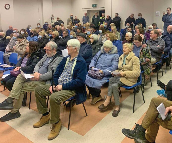 A packed SSI meeting pledges to halt a planned toxic incinerator