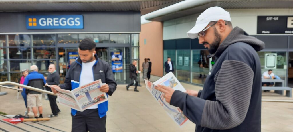 Strikers read the Socialist at Greggs HQ protest in Newcastle photo Elaine Brunskill