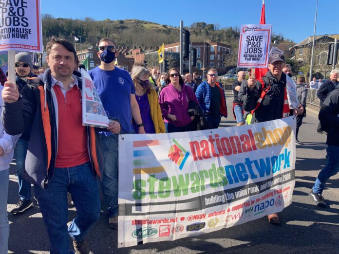 Save P&O jobs! Nationalise P&O now! NSSN banner on the solidarity protest in Dover, 18th March 2022, photo Nick Chaffey Save P&O jobs! Nationalise P&O now! NSSN banner on the solidarity protest in Dover, 18th March 2022, photo Nick Chaffey