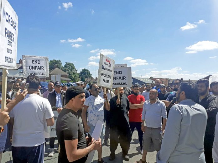 Drivers on strike protest outside Uber offices in Leeds - photo Iain Dalton