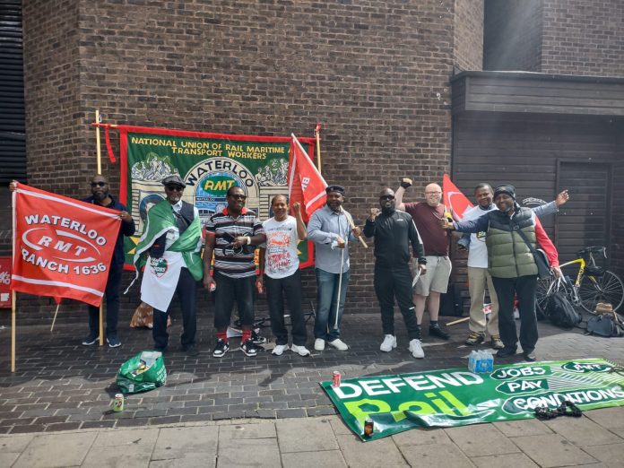 Workers at Waterloo station. Photo: James Ivens