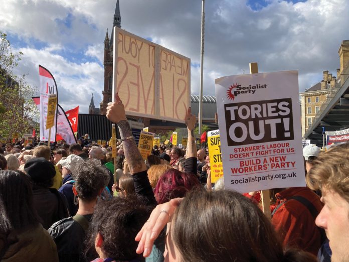 Tories Out. Protesters at Kings Cross supporting RMT strike. Photo: Paula Mitchell