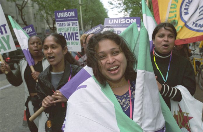 Unison members protesting against cuts