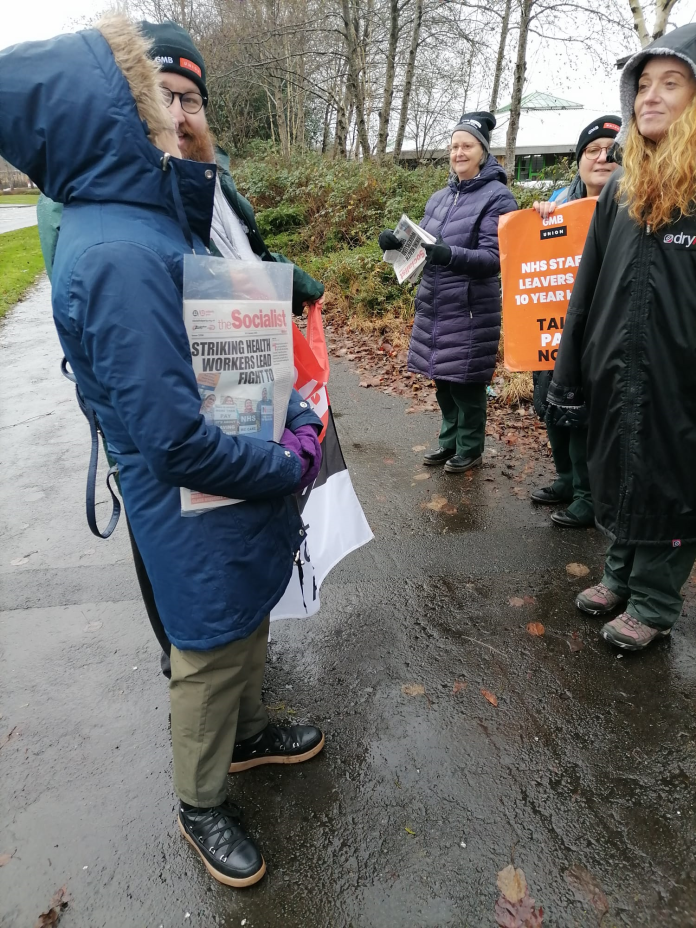 Gareth Bromhall and the striking ambulance workers in Swansea. Photo: Alec Thraves