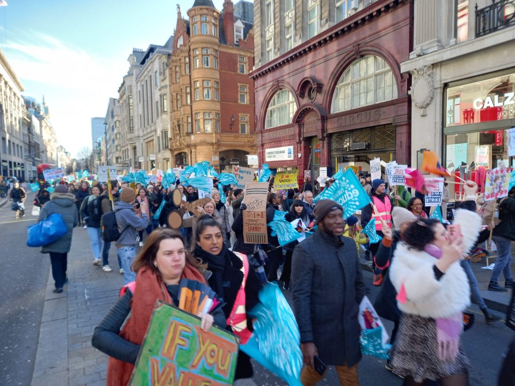 Marching in central London. 1.2.23. Photo by Scott Jones