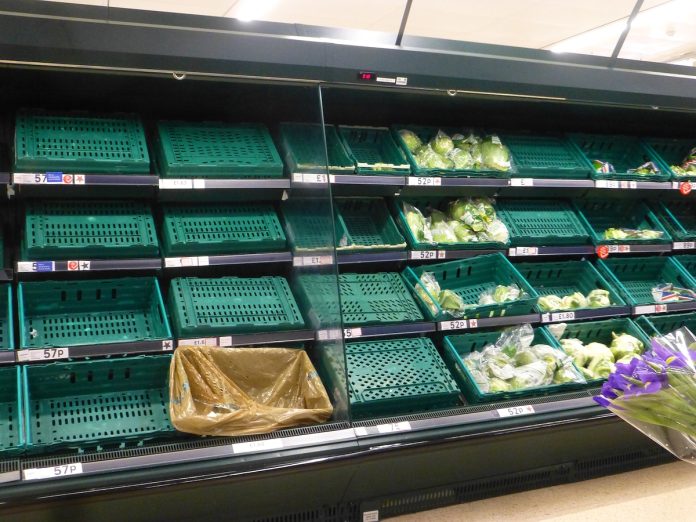 Empty shelves in a supermarket. Free public domain CC0 image.