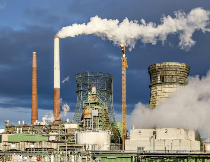 Godorf_Cologne_Rhineland-Refinery-Cooling-Towers-during-demolition-02 Godorf Cologne Rhineland Refinery. Photo: Uwe Aranas /CC
