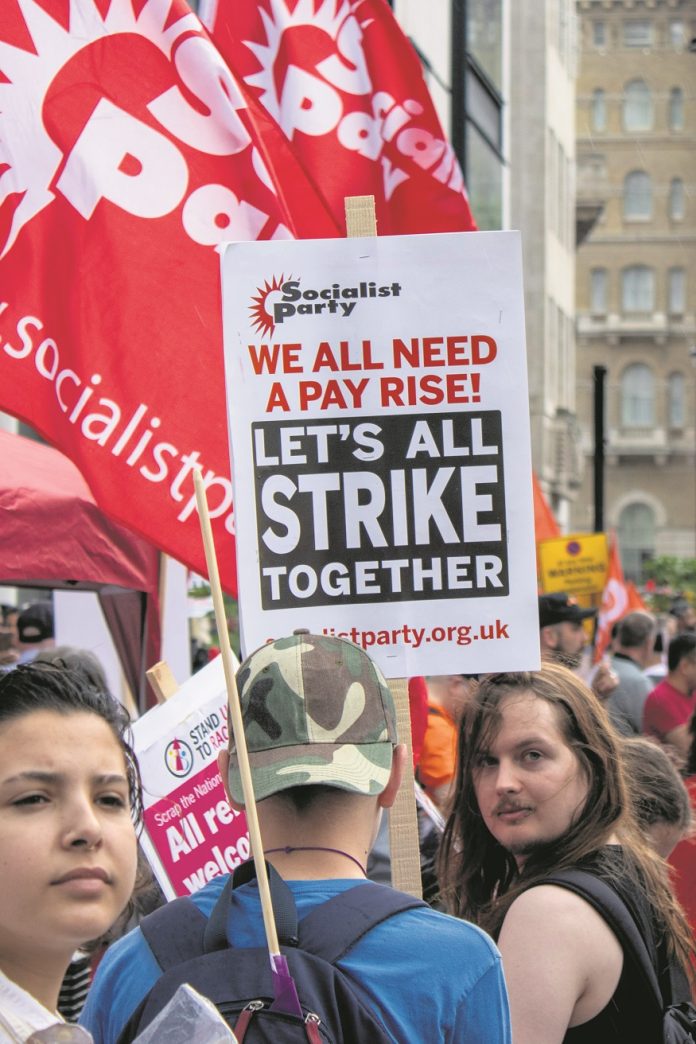 Placard on TUC protest 18 June 2022. Photo: Tommy Liverpool