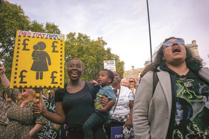 MOM-Mattsson Pregnant then Screwed March Of The Mummies protest demonstration to demand Government reform on childcare parental leave and flexible working conditions. March and rally from Trafalgar Square, Whitehall and Parliament Square central London Photo: Paul Mattsson