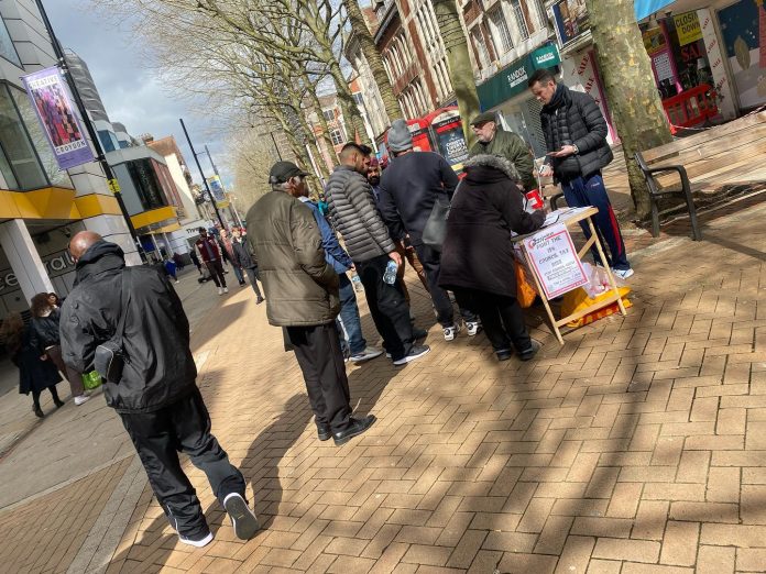 Socialist Party campaign stall in Croydon against the tax rise, photo London Socialist Party