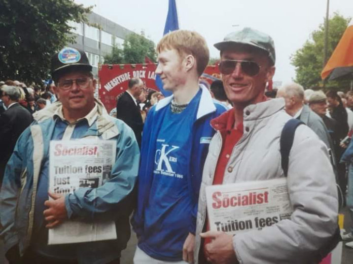 Trevor Grewar (right) with Tony Davison (left) marching in support of Liverpool dockers on strike in the 1990s