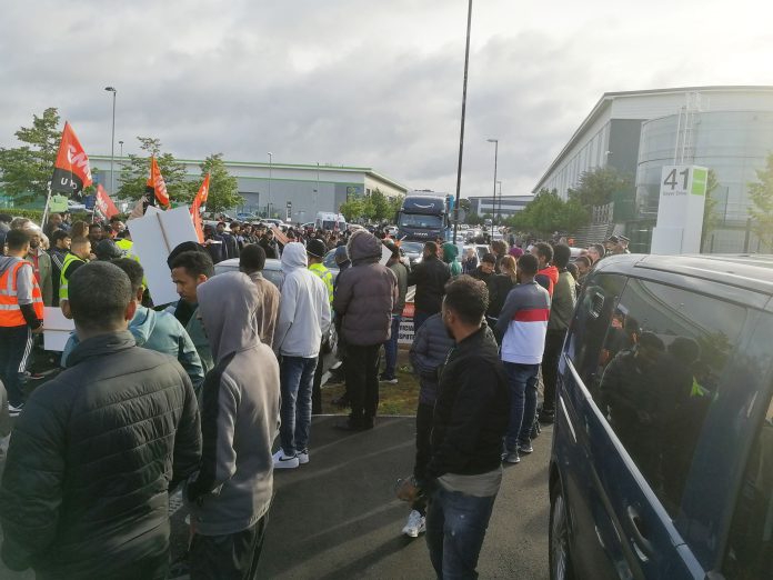 Hundreds gather in the early morning outside Coventry Amazon warehouse to strike. Photo: Cov SP