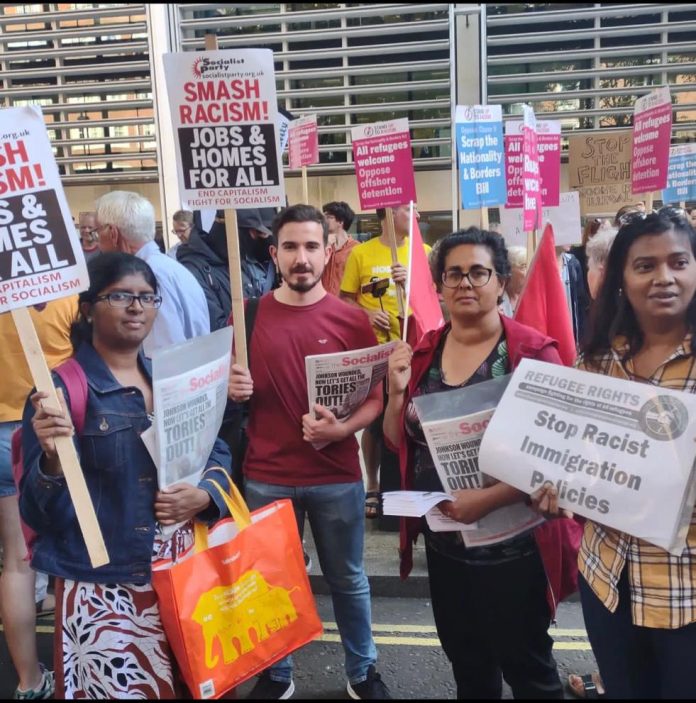 Lawanya (right) with the Socialist Party, Refugee Rights and Tamil Solidarity on a protest against Tory Rwanda deportations. Photo: Refugee Rights