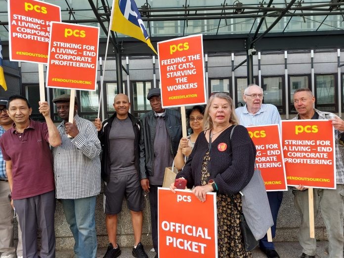 Marion Lloyd supporting workers employed by ISS at BEIS. Photo: Rob WIlliams