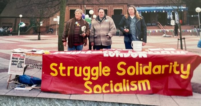 Brian (right) campaigning in West London