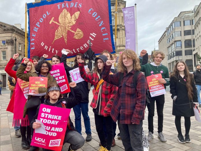 Liverpool socstu trades council banner Socialist Students standing in solidarity with university workers in the UCU in Liverpool on strike. Photo: Socialist Students