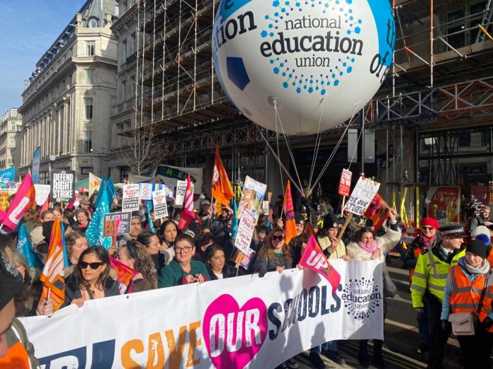 Save our schools reads NEU banner. Photo: Glenn