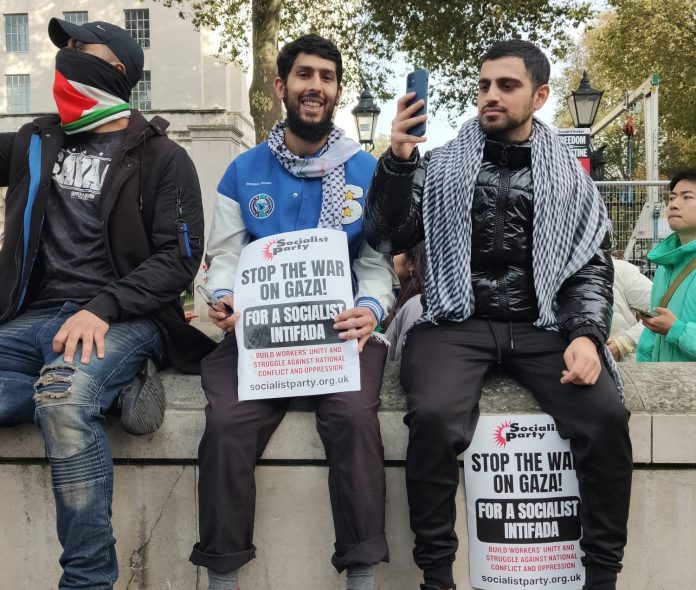 Socialist Party placards on demonstration against war on Gaza. Photo: Hugo Pierre