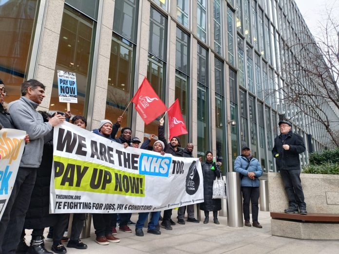 Barts strikers at Canary Wharf HQ. Photo: James Ivens