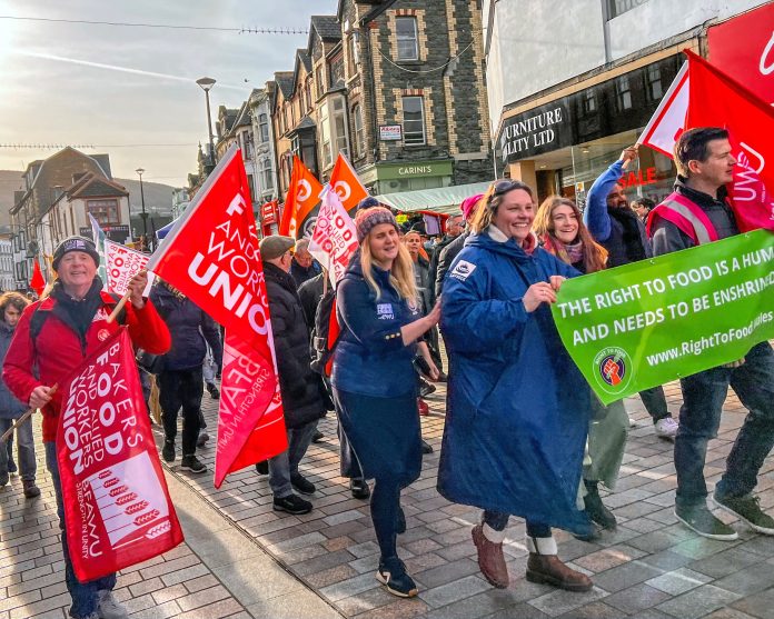 Beth Winter (centre) and the food marchers. Photo: Mariam Kamish