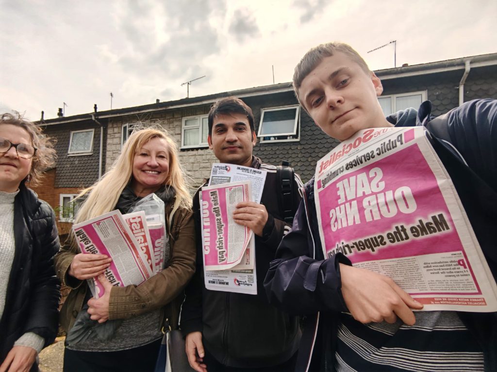 Adam (left) campaigning in Reading. Photo: Adam