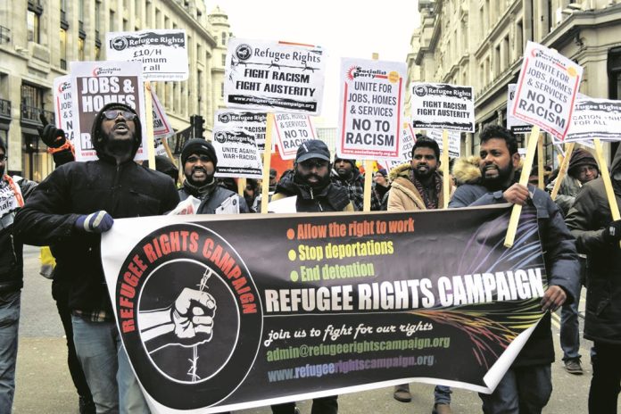 Refugee Rights banner. Photo: Senan