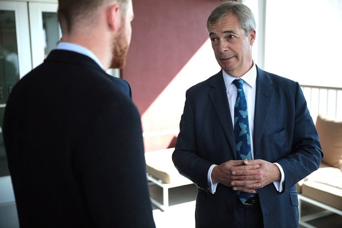 1024px-Nigel_Farage_with_supporter_(50544000836) Nigel Farage. Photo: Gage Skidmore/CC
