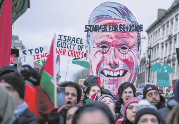 Starmer placard at anti-war protest. Photo: Paul Mattsson
