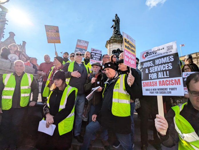 Hull - October 2024 - Iain Dalton Socialist Party member Kevin Pattison addresses the counter-demo as trade union stewards protect speakers and protesters from far-right provocation. Photo: Iain Dalton