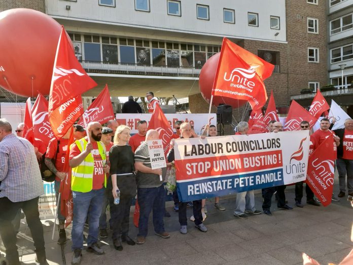 Coventry bin workers protest in defense of Unite rep Pete Randle Photo Coventry Socialist Party Sharon Graham standing alongside Coventry bin workers striking over pay and against union busting in 2022 - one of many groups of Unite members forced to fight Labour councils. under Starmer, the cuts continue. Photo: Cov SP