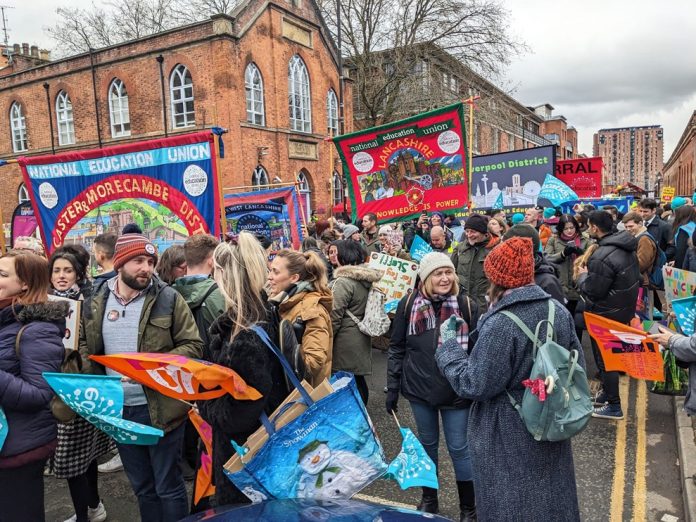 Manchester demo 2 28 scaled NEU's strike action in 2023 forced both Tory and Labour governments to offer more than they intended. Photo: strikes marching in Manchester - Martin Powell Davies