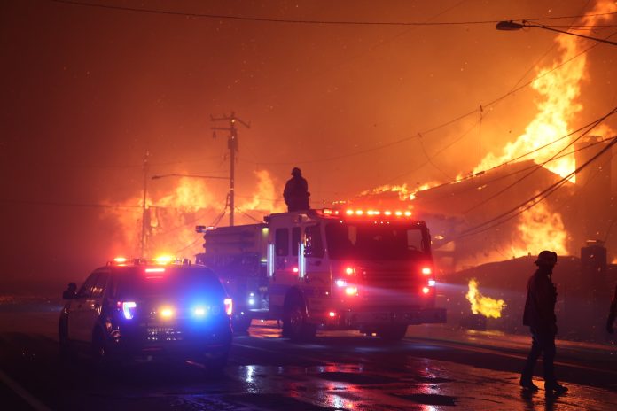 Palisades_Fire_(54254471976) Firefights battle a blaze in the Palisades are of LA. Photo: Public Domain