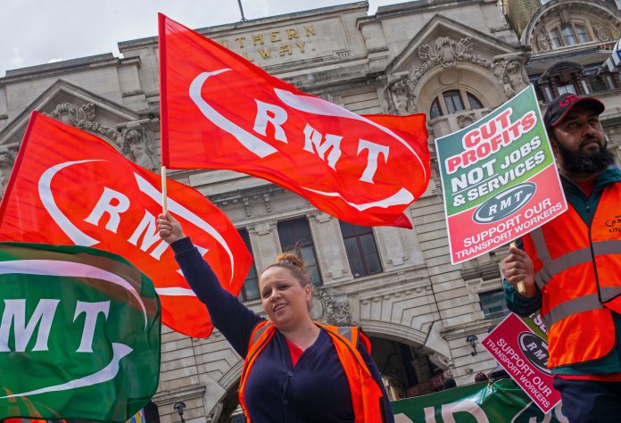 RMT member on strike. Photo: Paul Mattsson