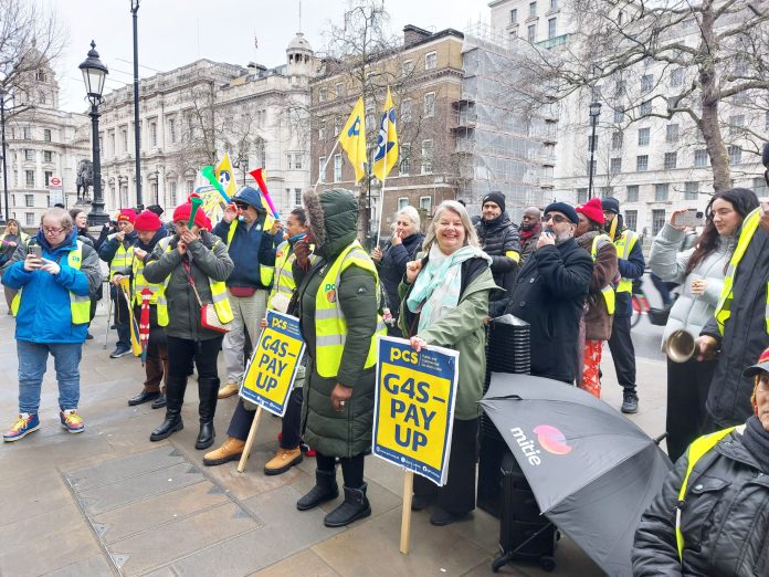 Marion Lloyd (centre) on the outsourced workers' picket line. Photo: Rob Williams