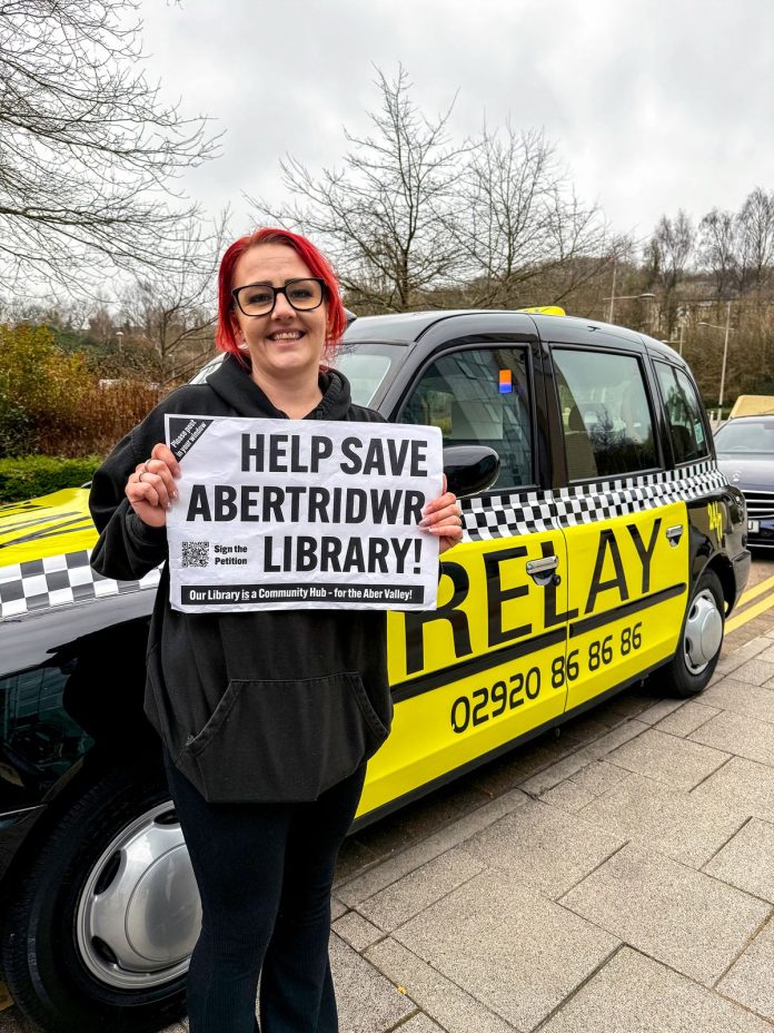 Leah, from Relay Taxis, supporting the campaign. Relay drove campaigners to the protest for free. Photo: Mariam Kamish