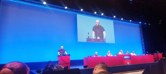 Reece at DWP conference Reece addressing conference. Photo: Socialist Party