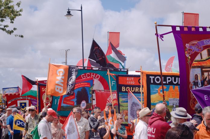 NICK7088 Trade unionists march at Tolpuddle Martyrs festival. Photo: Nick Clare