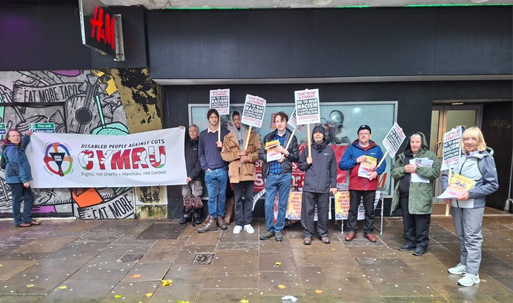 Swansea city centre protest - in torrential rain! Photo Alec T