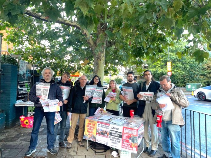 Socialist Party members campaigning ahead of a Your Party meeting in Brixton, South London