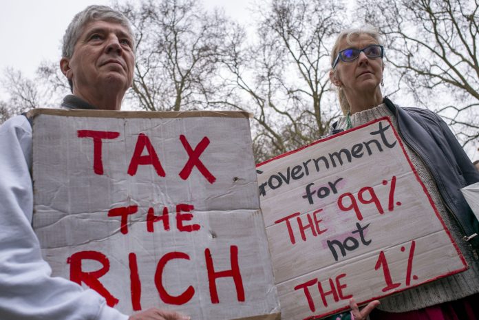 Treasury Rally-15 Protesters outside the Treasury against Labour cuts Photo: Paul Mattsson